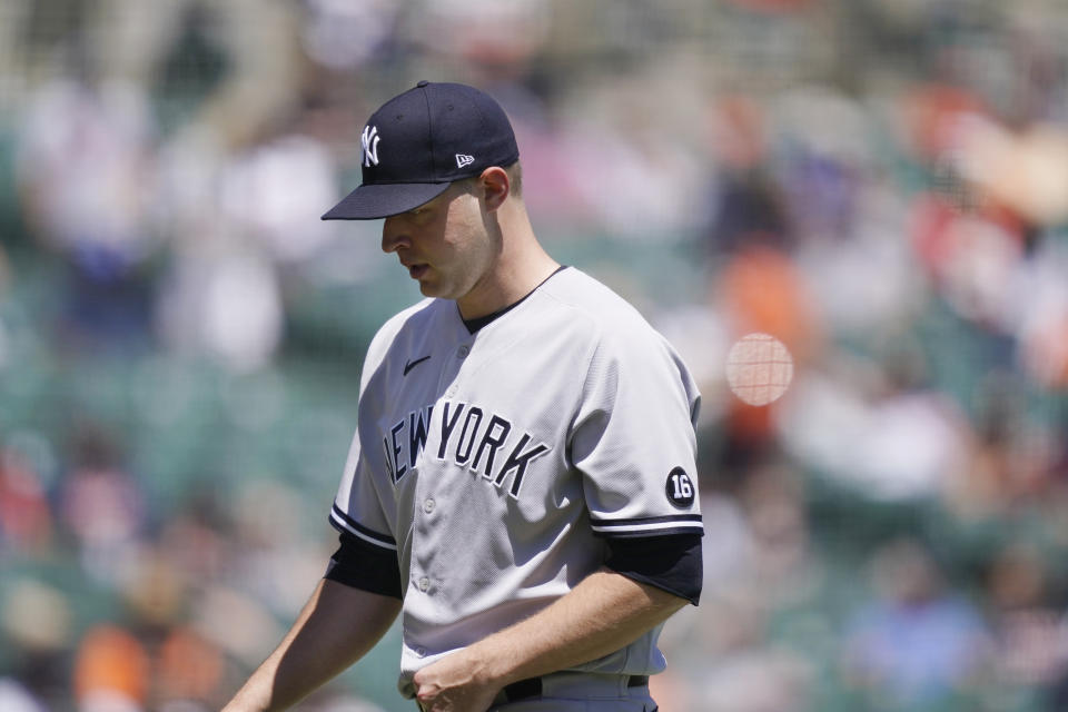 New York Yankees starting pitcher Michael King walks to the dugout after being relieved during the third inning of a baseball game against the Detroit Tigers, Sunday, May 30, 2021, in Detroit. (AP Photo/Carlos Osorio)