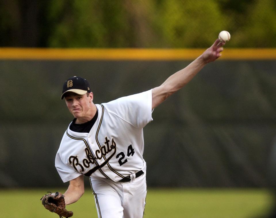 050303--Gainesville, Fla.--Buchholz pitcher Andrew Miller pitches in the first inning of their playoff game Tuesday against Englewood.