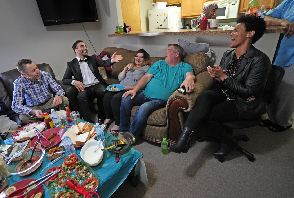 Sulaman Akbarzada, second from left, and Arzo Akbarzada made their marriage official with a new service Sunday, April 3, 2022 in Indianapolis. After the Indy service, friends joined them for good food, stories and laughter. 