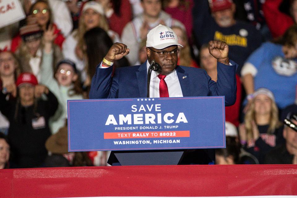 Republican House of Representative candidate John Gibbs speaks during a rally at the Michigan Stars Sports Center in Washington Township on April 2, 2022.