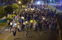 <p>Protesters march down South Blvd. into Charlotte, N.C., Saturday, Sept. 24, 2016. (Jeff Siner/The Charlotte Observer via AP)</p>