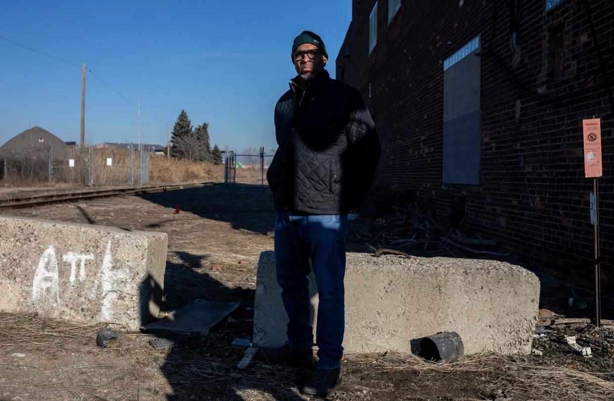 Darryl Morgan, 57, stands outside the Environmental Wood Solutions facility in Detroit on Tuesday, Feb. 20, 2024. Morgan is one of the plaintiffs in a race discrimination lawsuit against the Lake Orion-based trucking company Environmental Wood Solutions. He worked as a heavy haul truck driver at Environmental Wood Solutions for over a year.
