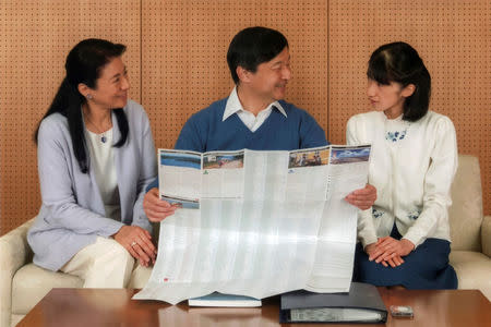 Japan's Crown Prince Naruhito (C), Crown Princess Masako (L) and their daughter Princess Aiko are pictured at Togu Palace in Tokyo, Japan February 12, 2017, in this handout photo released by Imperial Household Agency of Japan. Naruhito celebrates his 57th birthday on February 23, 2017. Imperial Household Agency of Japan via Reuters