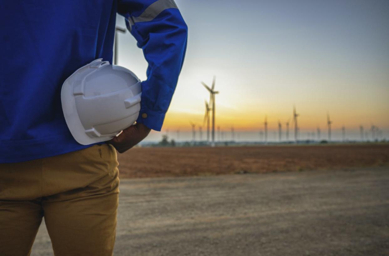 Renewable energy jobs often aren't close to fossil fuel workers' homes. <a href="https://www.gettyimages.com/detail/photo/portrait-of-a-wind-turbine-engineer-royalty-free-image/1433295579" rel="nofollow noopener" target="_blank" data-ylk="slk:Prapass Pulsub/Moment via Getty Images;elm:context_link;itc:0;sec:content-canvas" class="link ">Prapass Pulsub/Moment via Getty Images</a>