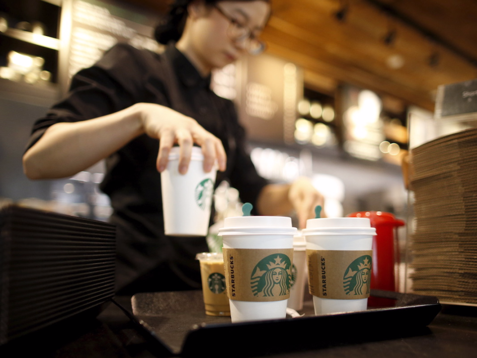 A staff serves beverages at a Starbucks coffee shop in Seoul, South Korea, March 7, 2016. Picture taken March 7, 2016.