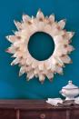 <p>Paint the tips for an elegant twist on this harvest staple.</p><p><strong>Step 1: </strong>Wrap corn husks around an 18-inch diameter straw wreath, using a hot-glue gun to adhere the edges. You'll need about 35 husks to completely cover the wreath form.</p><p><strong><strong>Step 2: </strong> </strong>Using a foam brush, paint the tips of 48 additional corn husks with gold acrylic paint; let dry (about 15 minutes).</p><p><strong>Step 3: </strong> Starting with the outer edge of the wreath, use hot-glue to adhere three concentric rings of 16 corn husks each. (Attach the second ring to the middle of the wreath and the third to its inner edge.) For the second and third rings, position the tip of each corn husk between two corn husks from the previous ring.</p>