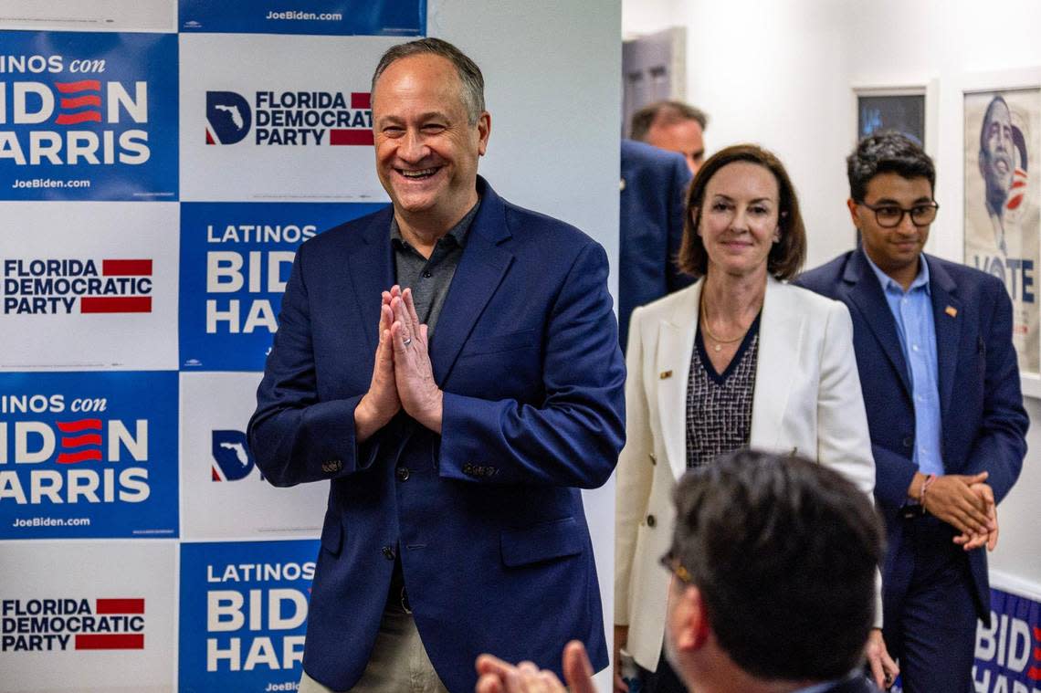 Second Gentleman Doug Emhoff reacts to applause as he arrives at the opening of the Miami-Dade Democratic Hispanic Caucus Office in Coral Gables, Florida, on Wednesday, March 27, 2024. The visit also highlighted the launch of the campaign’s Latino outreach program in Florida.