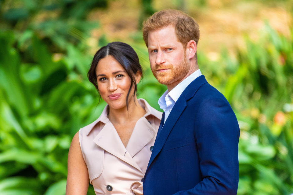 Prince Harry and Meghan Markle are pictured.