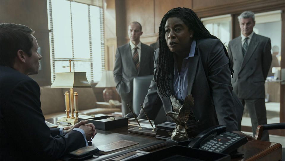 Tyler Ritter as John Brownlee and Uzo Aduba as Edie in Painkiller.