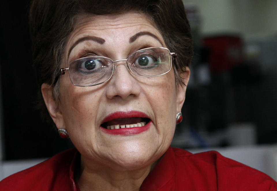 Maria Luisa Borja speaks during a interview in Tegucigalpa, Honduras, Saturday Jan. 26, 2019. Days before Honduras’ national elections in 2017, the former national police commissioner held a news conference at which she read from government investigative reports about three high-profile killings. Now, as an opposition lawmaker, she faces the possibility of a fine and, more significantly, the loss of her seat in Congress when she goes on trial Monday, Jan. 28 charged with defamation. (AP Photo/Fernando Antonio)