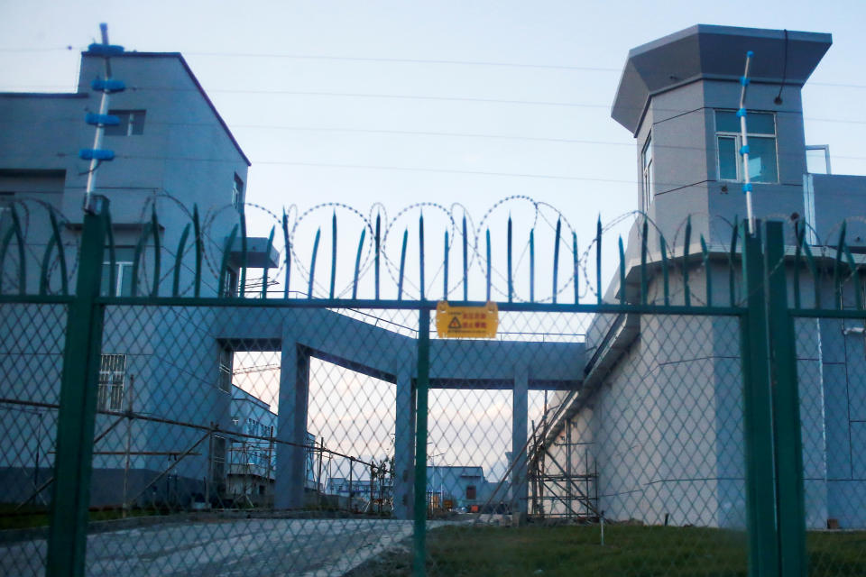 A perimeter fence is constructed around what is officially known as a vocational skills education centre in Dabancheng (Thomas Peter / Reuters file)