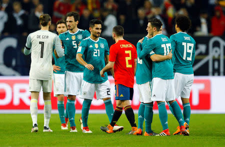 Soccer Football - International Friendly - Germany vs Spain - ESPRIT arena, Dusseldorf, Germany - March 23, 2018 Spain and Germany players shake hands after the match REUTERS/Thilo Schmuelgen