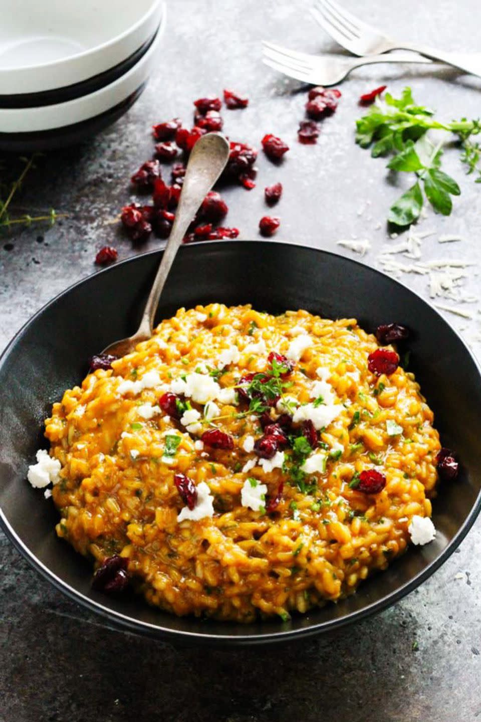 <p>The rich pumpkin flavor makes everything even better in this creamy meal.</p><p><strong>Get the recipe at <a rel="nofollow noopener" href="http://www.platingsandpairings.com/pumpkin-risotto-with-goat-cheese-dried-cranberries/" target="_blank" data-ylk="slk:Platings & Pairings;elm:context_link;itc:0;sec:content-canvas" class="link ">Platings & Pairings</a>. </strong><br></p>