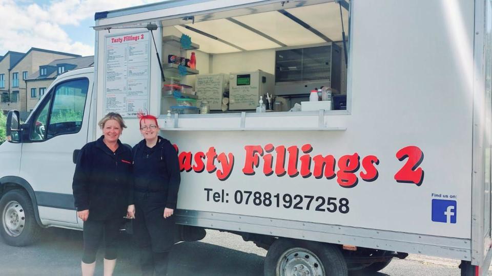 Jean Wall and her business partner Andrea Davey stood outside their mobile sandwich van