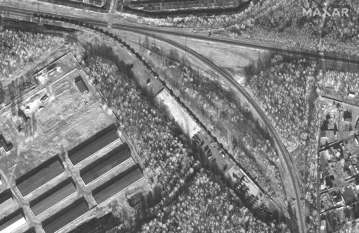 Overview shows armored vehicles and equipment at a railyard near Brestsky training area, Belarus, Feb. 16, 2022 (Satellite image &#xa9;2022 Maxar Technologies)