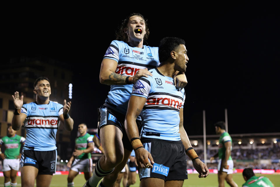 Ronaldo Mulitalo and Nicho Hynes celebrate.