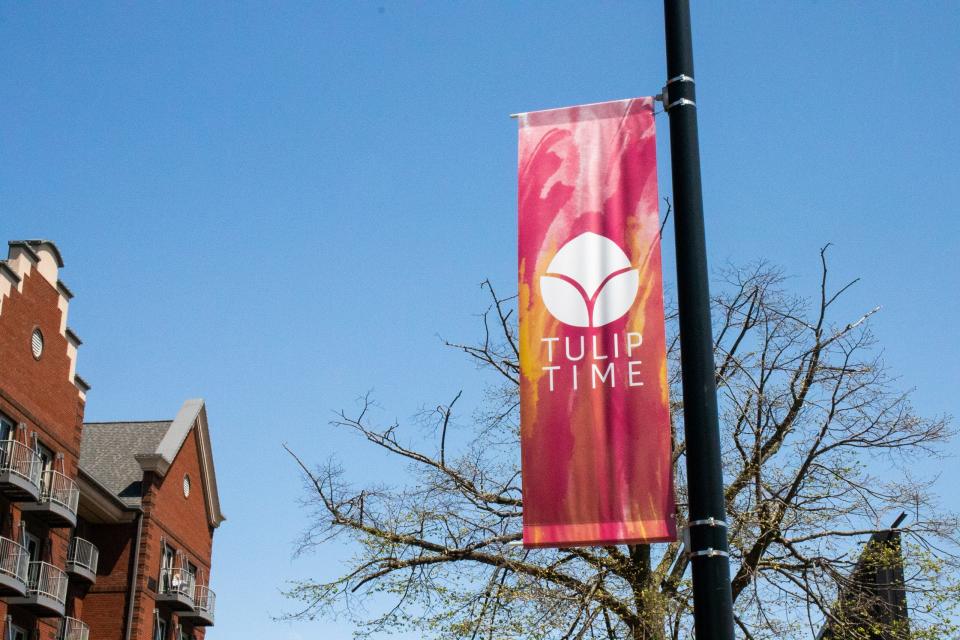 A banner on a street light that reads "Tulip Time"