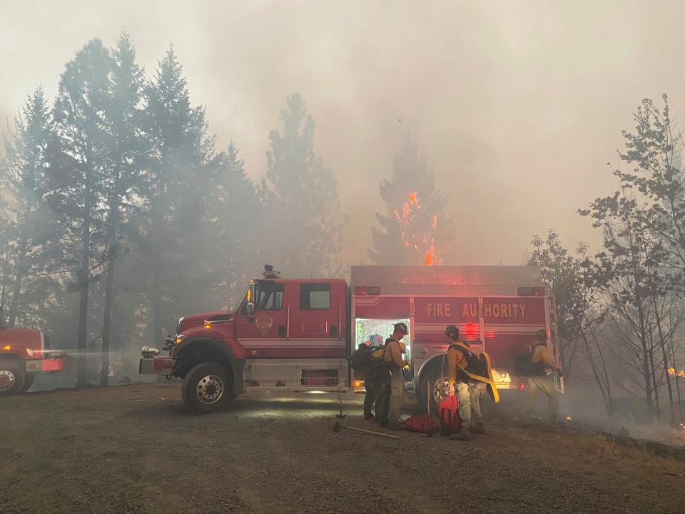 Utah fire crews prepared to fight wildfires near Butte Falls in southern Oregon in September 2020. Firefighters trying to contain massive wildfires that month in Oregon, California and Washington state were constantly on the verge of exhaustion as they tried to save suburban houses, including some in their own neighborhoods.