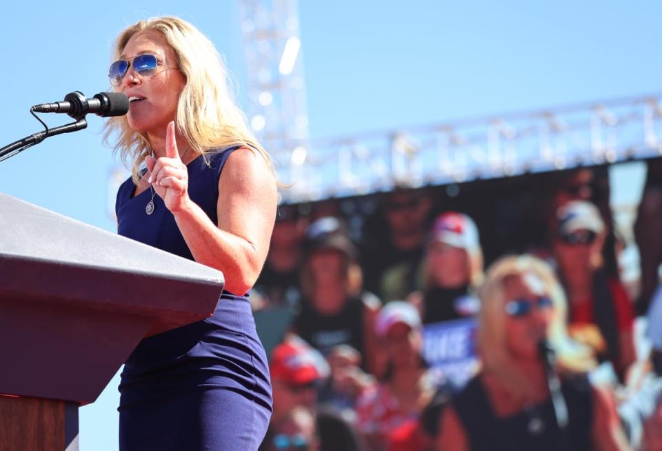 Rep Marjorie Taylor Greene speaks during a campaign rally on 9 October 2022 in Mesa, Arizona (Mario Tama/Getty Images)