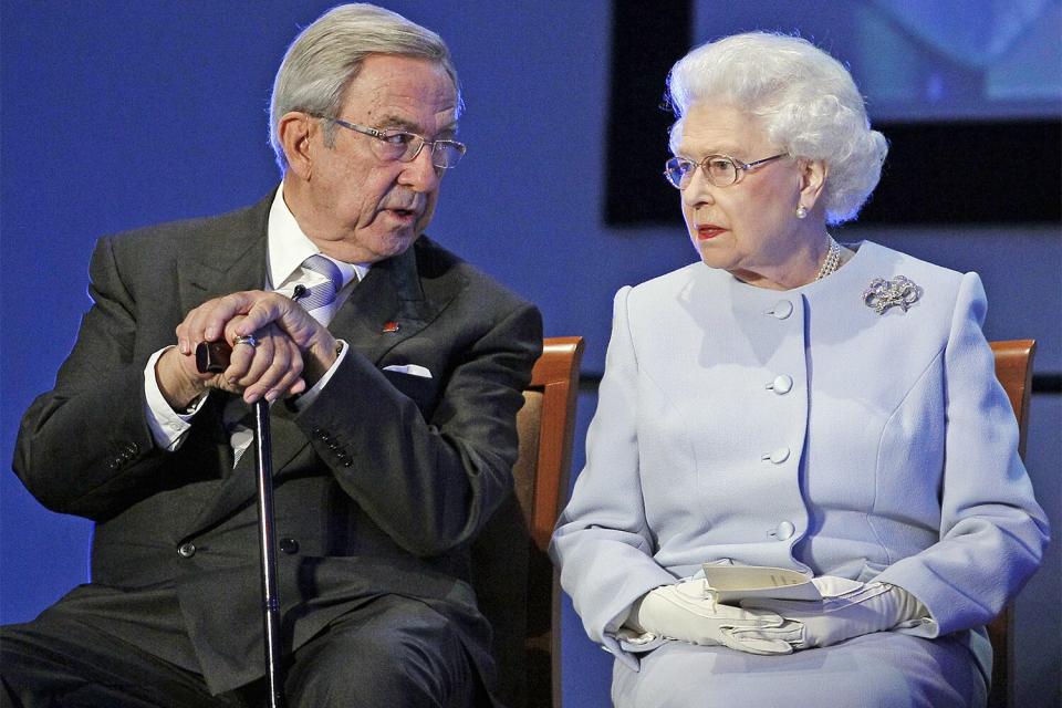 CROWTHORNE, ENGLAND - OCTOBER 17: Queen Elizabeth II speaks with King Constantine of Greece during the opening ceremony of the Round Square International Conference at Wellington College on October 17, 2011 in Crowthorne, Berkshire, England. (Photo by Kirsty Wigglesworth - WPA Pool/Getty Images)