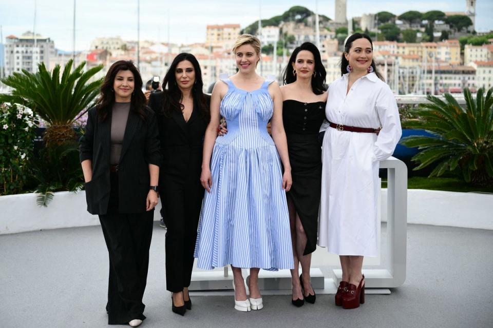 Members of the Jury of the 77th Cannes Film Festival, Turkish writer and photographer Ebru Ceylan, Lebanese director Nadine Labaki, US director and president of the Jury of the 77th Cannes Film Festival Greta Gerwig, French actress Eva Green and US actress Lily Gladstone (AFP via Getty Images)