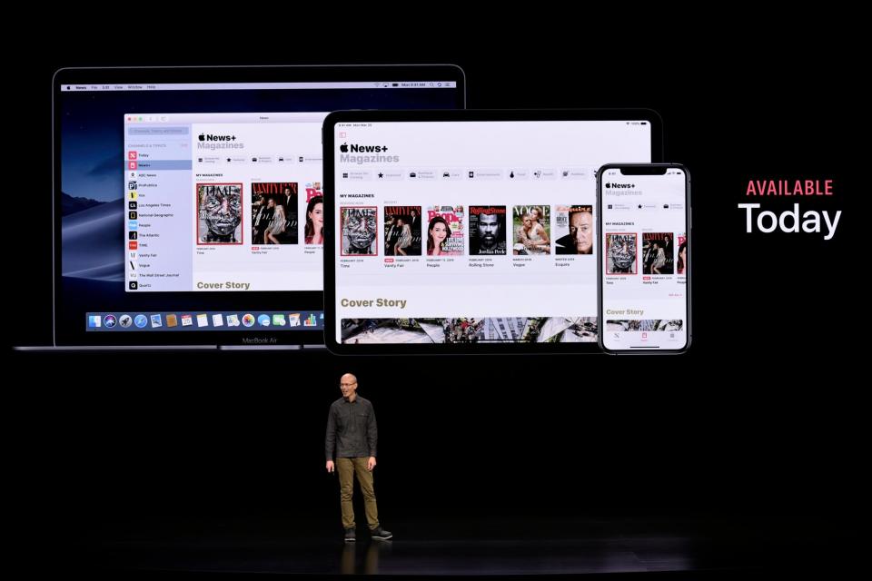 Roger Rosner, vice president of applications at Apple Inc., introduces its new subscription-based magazine service (Getty Images)