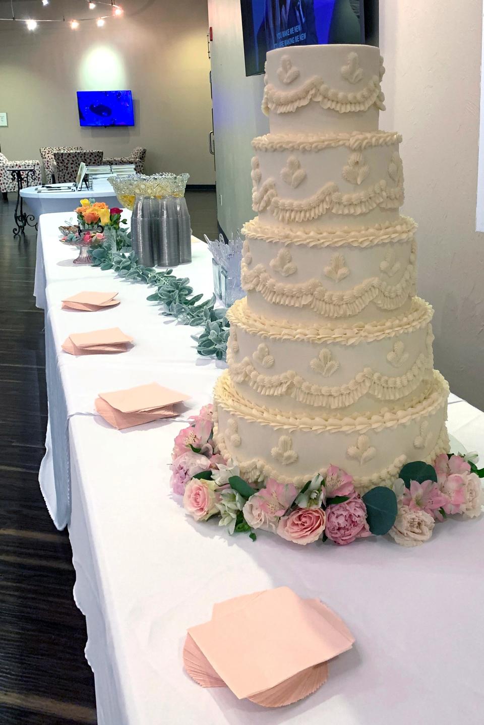 A wedding cake sits in the lobby of Edmond's Acts 2 United Methodist Church where more than 100 couples renewed their wedding vows as a nod to the convergence of Valentine's Day and Ash Wednesday.