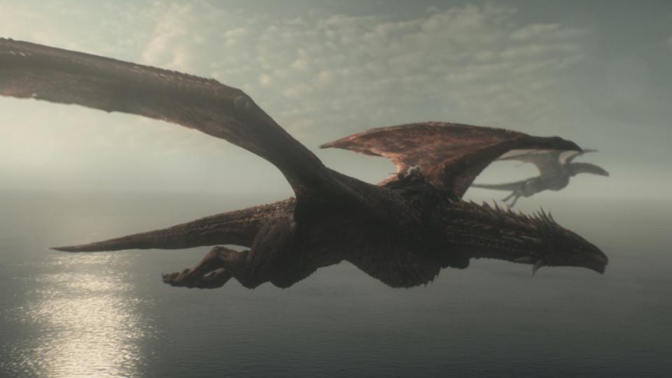Rhaenys flies her dragon Meleys next to her son Laenor riding his dragon Seasmoke on House of the Dragon