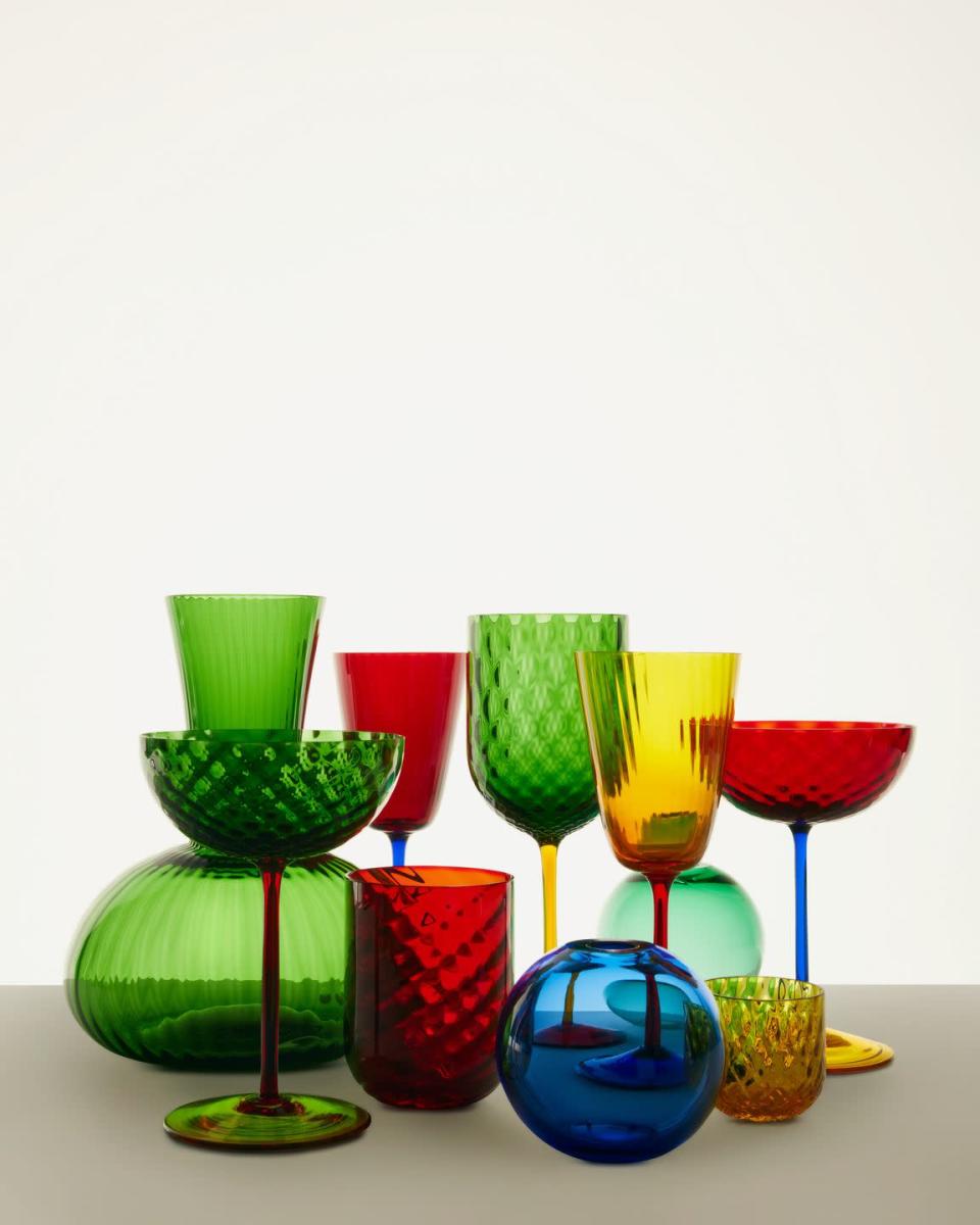 <p>There’s a celebratory feel to this colourful collection of glassware from Dolce & Gabbana. Each piece is crafted from Murano glass and is decorated with the typically Venetian diamond Balloton pattern. Perfect for aperitivo hour. From £215, <a href="https://www.dolcegabbana.com/en/home/table/glasses/?prefn1=customFilter3&prefv1=Wine+glasses" rel="nofollow noopener" target="_blank" data-ylk="slk:dolcegabbana.com" class="link ">dolcegabbana.com</a></p>