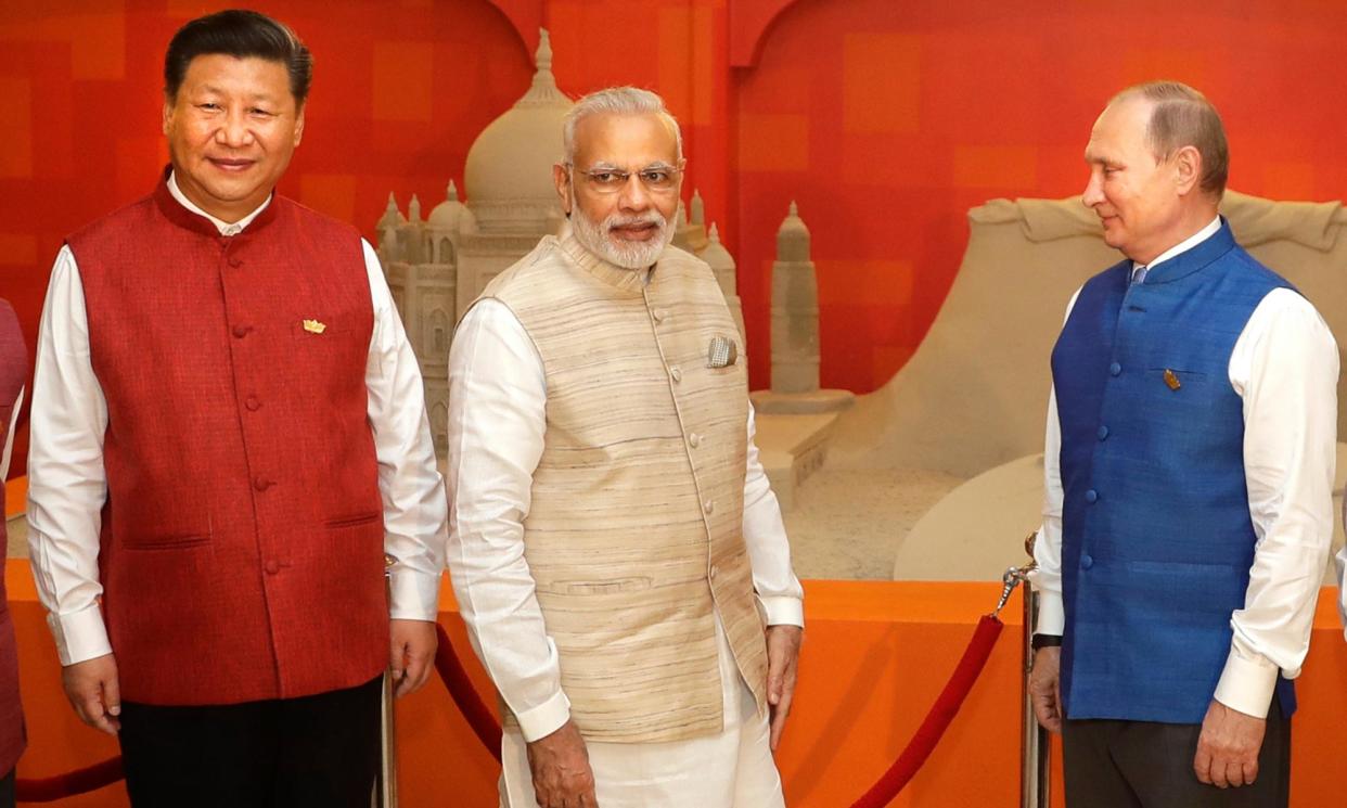 <span>Indian Prime Minister Narendra Modi, Russian President Vladimir Putin and Chinese President Xi Jinping at the Brics summit in 2016.</span><span>Photograph: Manish Swarup/AP</span>