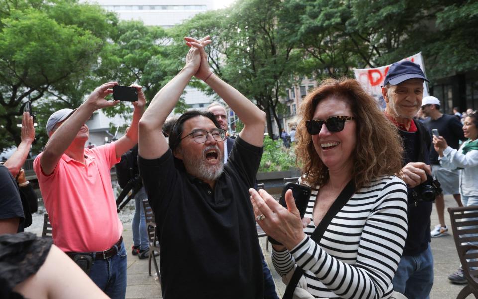 People react outside Manhattan criminal court to the verdict in former U.S. President Donald Trump's criminal trial