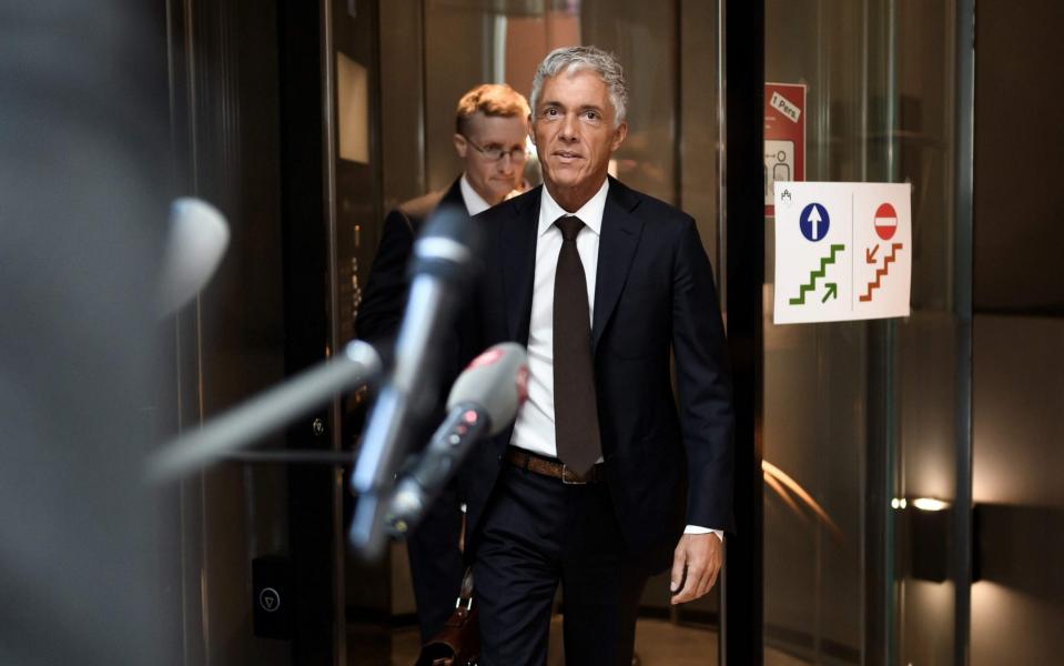 Switzerland's attorney general Michael Lauber arrives for his hearing - AFP