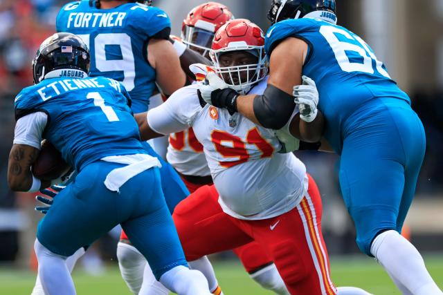 Kansas City Chiefs defensive tackle Derrick Nnadi (91) is seen on the  sideline during an NFL