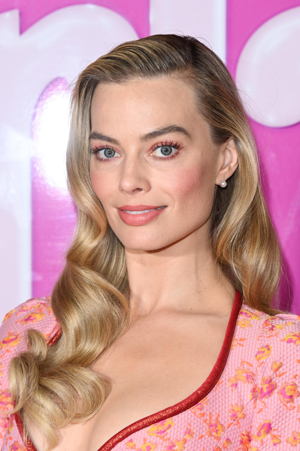 Close-up of Margot at a media event