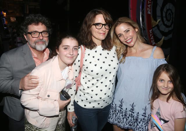 Bruce Glikas/WireImage Tina Fey, her husband Jeff Richmond, their friend Kerry Butler and Fey and Richmond's daughters Alice Zenobia Richmond and Penelope Athena Richmond backstage at the hit musical based on the film 'Beetlejuice' on Broadway on June 8, 2019 in New York City