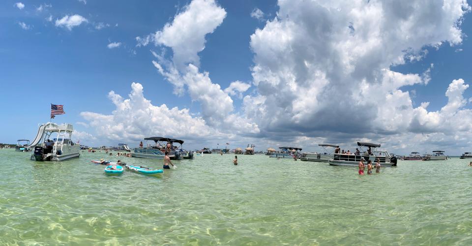 People enjoy a beautiful day at Crab Island in Destin. The Okaloosa County Sheriff's Office, Florida Fish and Wildlife Conservation Commission and Coast Guard teamed up for Operation Dry Water over the Fourth of July weekend.