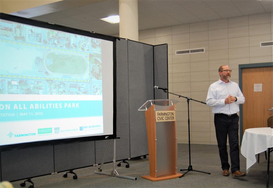 Greg Miller of MRWM Landscape Architects addresses the crowd at a meeting about the design of an all-abilities park at the Farmington Civic Center on May 11.