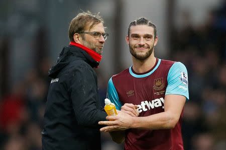 Football Soccer - West Ham United v Liverpool - Barclays Premier League - Upton Park - 2/1/16 Liverpool manager Juergen Klopp with West Ham's Andy Carroll at the end of the match Action Images via Reuters / John Sibley Livepic