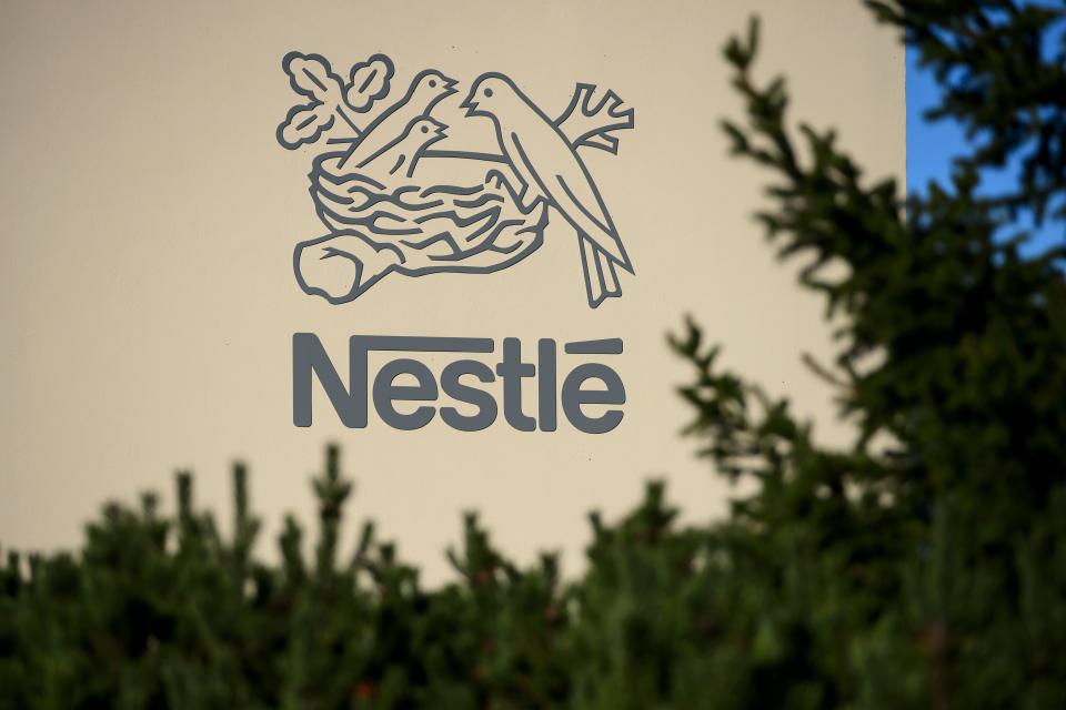 A logo of the world's leading food industry group Nestle is seen on October 9, 2014 at the group's Research Center in Vers-chez-les-Blanc above Lausanne.  AFP PHOTO / FABRICE COFFRINI        (Photo credit should read FABRICE COFFRINI/AFP/Getty Images)