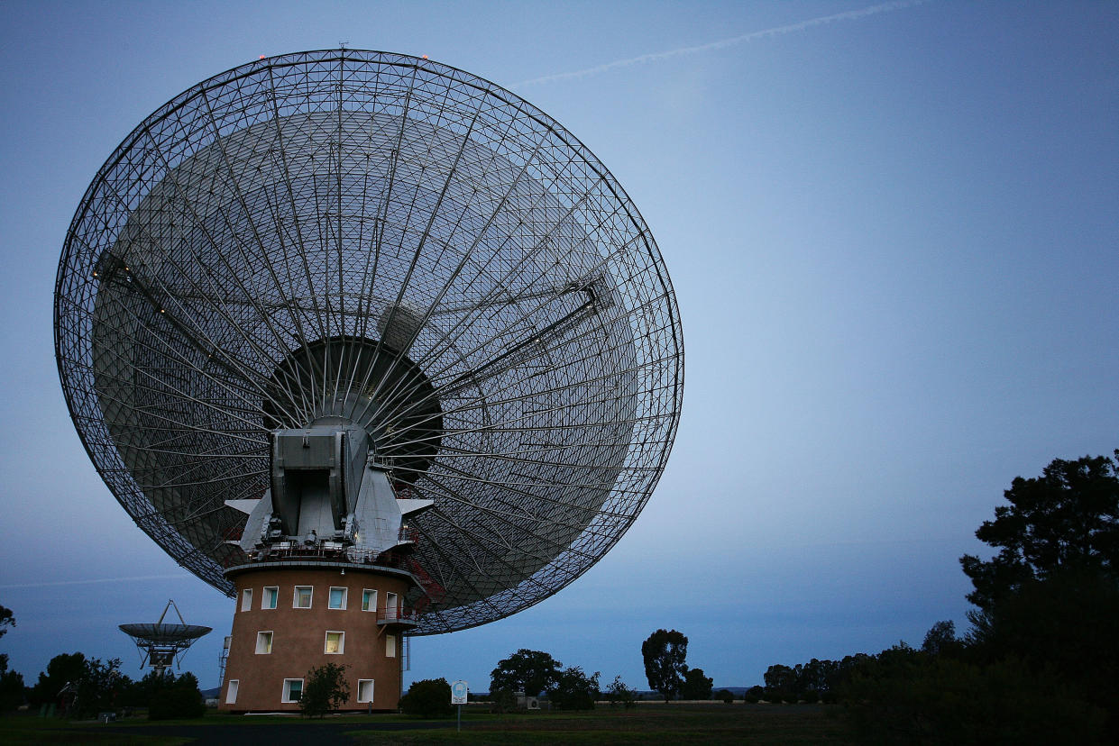 PARKES, AUSTRALIA - JUNE 13:  (AUSTRALIA & NEW ZEALAND MAGAZINES OUT UNTIL OCT 1, 2009)  The Australian Commonwealth Scientific and Industrial Research Organisation's (CSIRO) Australia Telescope National Facility (ATNF) Parkes Observatory radio telescope as seen on June 13, 2009 in Parkes, Australia. Known affectionately as The Dish, it is one of the largest radio telescopes in the Southern Hemisphere and was used by NASA during the Apollo 11 mission which saw man walk on the moon for the first time. The Dish became a house hold name when an Australian film of the same name directed by Rob Sitch was released in 2000 - it went on to become the highest grossing film of that year in Australia. These photographs were taken during filming for the BBC Knowledge production 'One Small Step: The Australian Story', which chronicles the 24hours surrounding man walking on the moon. Hosted by Peter FitzSimons, the programme counts down to the moon landing and the most famous human footsteps, to celebrate the mission's 40th anniversary this year. (Photo by Lisa Maree Williams/Getty Images)