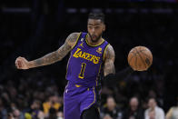 Los Angeles Lakers guard D'Angelo Russell (1) passes during the first half of an NBA basketball game against the Toronto Raptors Friday, March 10, 2023, in Los Angeles. (AP Photo/Marcio Jose Sanchez)