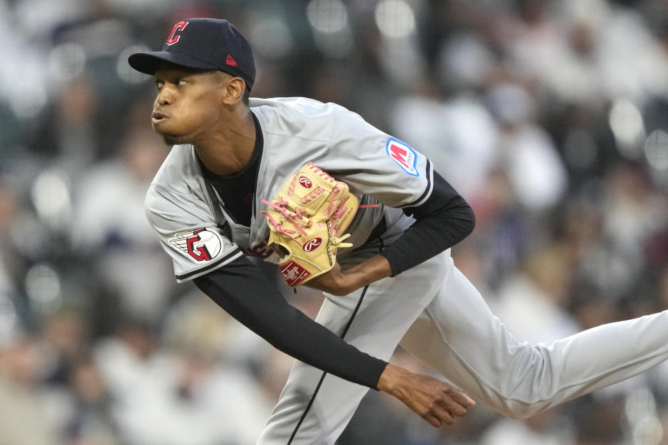 Cleveland Guardians pitcher Triston McKenzie exhales as he follows through during the sixth inning of a baseball game against the Chicago White Sox on Saturday, May 11, 2024, in Chicago. (AP Photo/Charles Rex Arbogast)