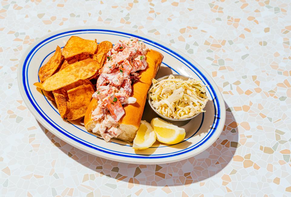 Lobster rolls include a pound of fresh lobster in a top-sliced, toasted, buttered roll at Table 301's Jones Oyster Co. on E. Court St. in downtown Greenville