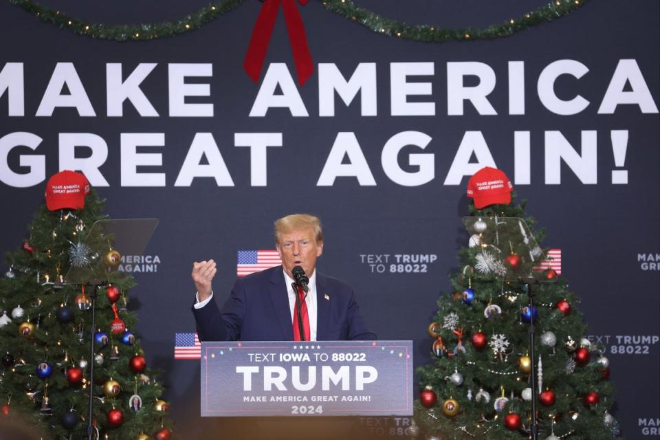 Donald Trump speaks to guests t the event. (Getty Images)