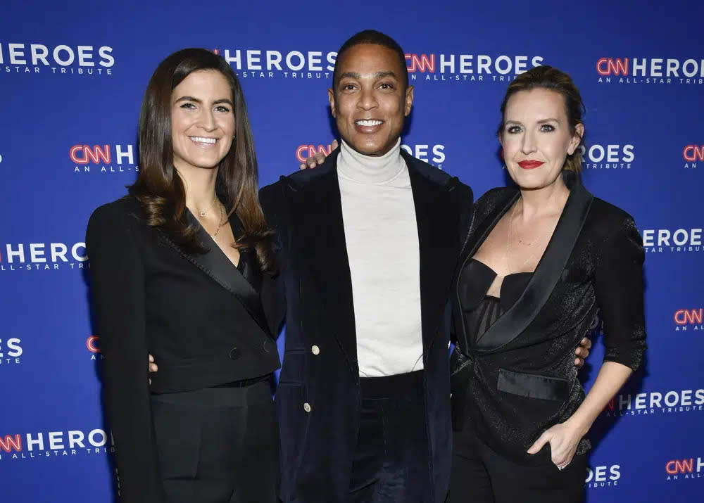 CNN anchors Kaitlan Collins, from left, Don Lemon and Poppy Harlow appear at the 16th annual CNN Heroes All-Star Tribute on Dec. 11, 2022, in New York. (Photo by Evan Agostini/Invision/AP, File)