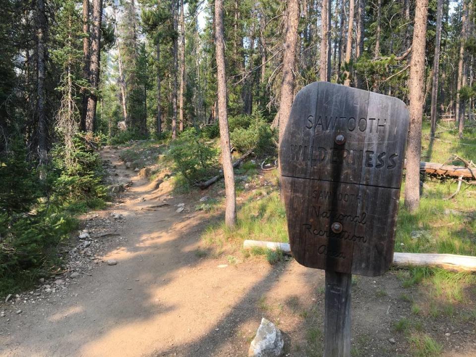 A sign on the Iron Creek-Stanley Lake Trail marks the spot where visitors enter the Sawtooth Wilderness Area within the Sawtooth National Recreation Area. It’s important to know the rules within any wilderness area you’re visiting, such as keeping your dog on a leash from July 1 through Labor Day in the Sawtooth Wilderness.