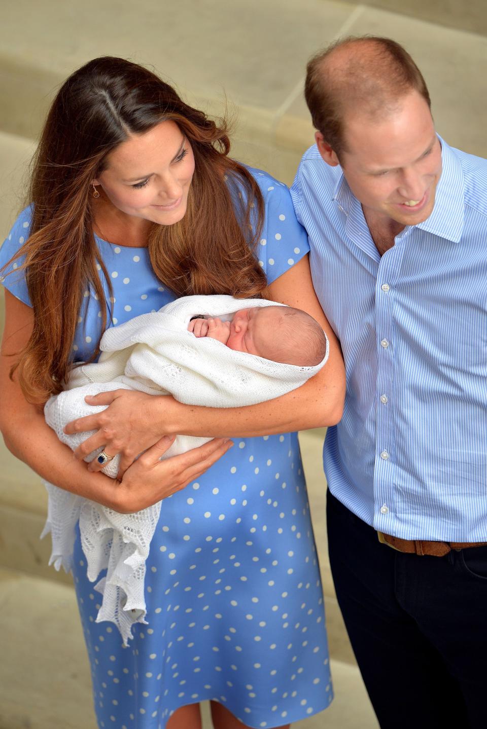 In the safe hands of the Duchess of Cambridge with her husband the Duke of Cambridge and their her son who was born yesterday, the Royal couple leave the Lindo Wing of St Mary's Hospital in west London.