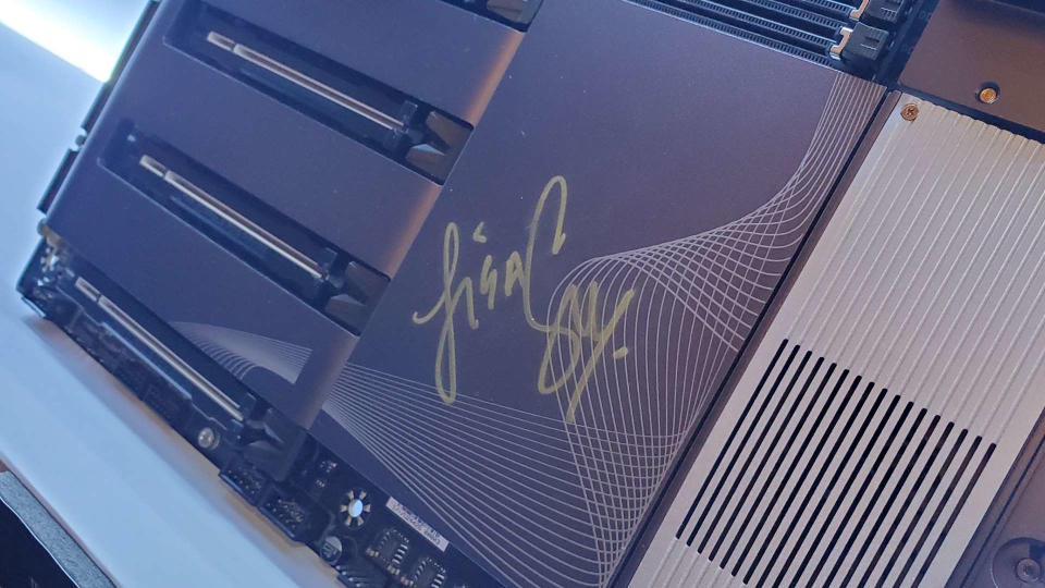 A photo of the signature of AMD's Dr Lisa Su on a Gigabyte motherboard, on display at Computex 2024