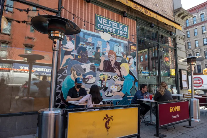 Customers dine at Veselka's outdoor dining amid the coronavirus pandemic in the East Village on April 07, 2021 in New York City.