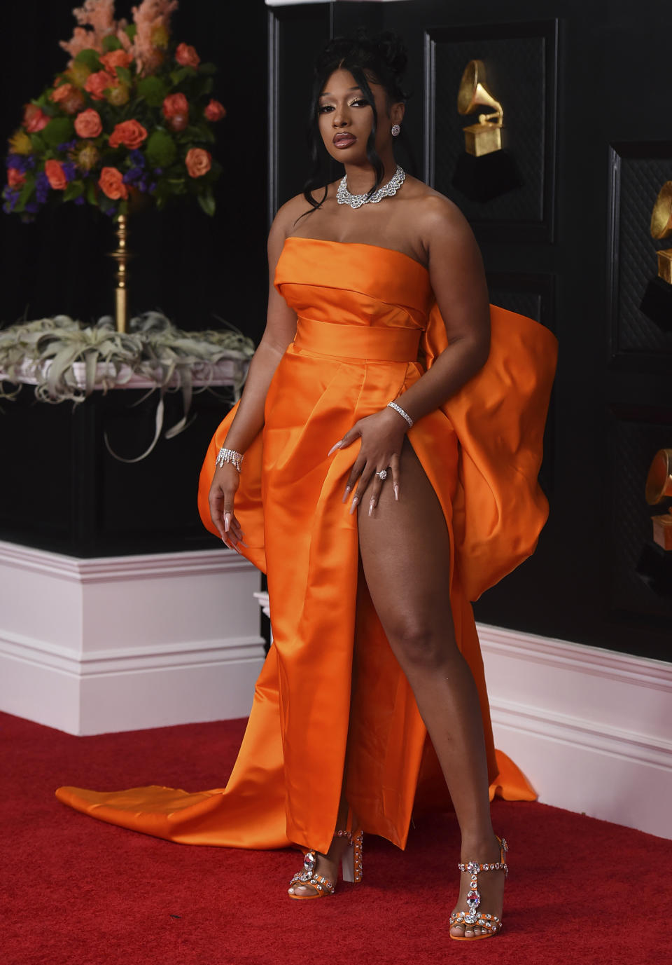 Megan Thee Stallion arrives at the 63rd annual Grammy Awards at the Los Angeles Convention Center on Sunday, March 14, 2021. (Photo by Jordan Strauss/Invision/AP)